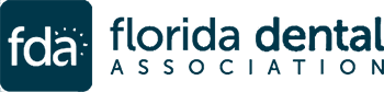The image displays a logo with text that reads  Florida Dental Association  against a grey background.